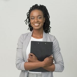 Smiling African American Business Lady Holding Folder, Studio Shot